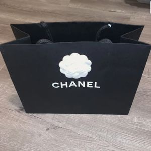 Auth. Chanel paper shopping bag With Flower 9x7x2.5” Size S